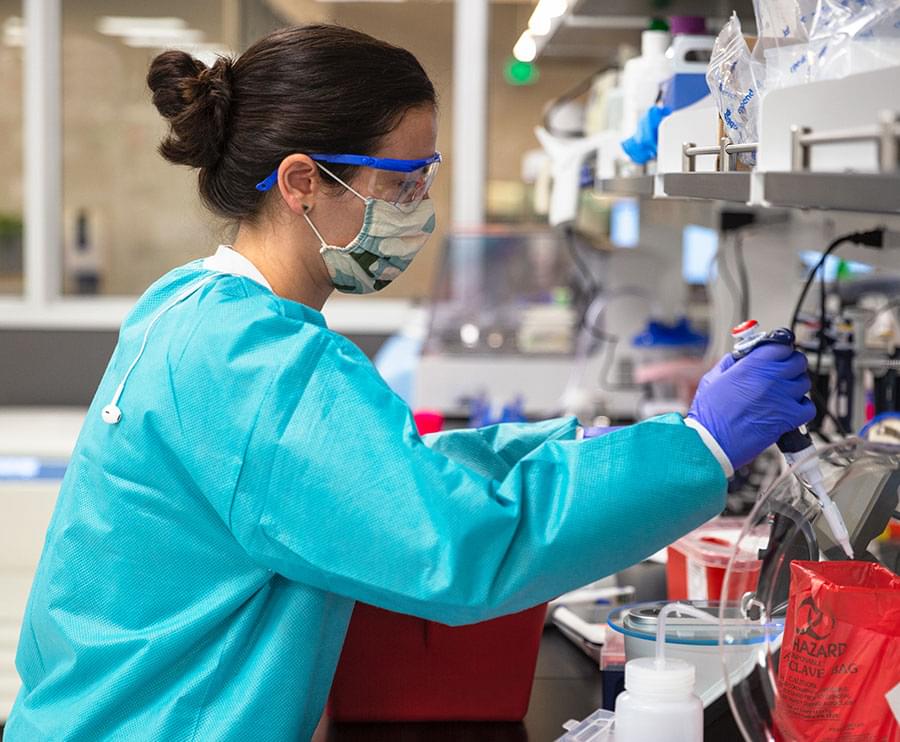 Image of scientist in research lab